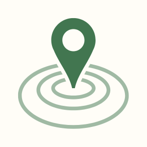 Icône de localisation avec un pointeur vert sur un fond clair.