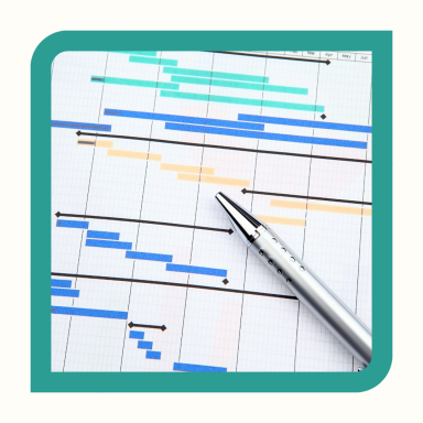 Diagramme de Gantt avec des barres horizontales et un stylo en métal.